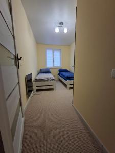 Ένα ή περισσότερα κρεβάτια σε δωμάτιο στο 13 Hostel