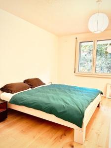 Ένα ή περισσότερα κρεβάτια σε δωμάτιο στο Gemütliches Häuschen mit offenem Innenhof