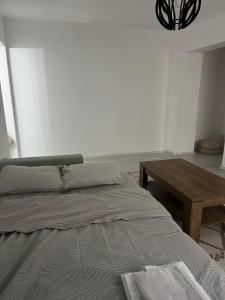 Giường trong phòng chung tại Beatrice Residence Centru Vechi +4 ảnh