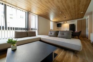 Posezení v ubytování OnsenSauna Villa Jozankei Yuk + 58 fotografií