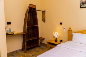 Postel nebo postele na pokoji v ubytování Lastanza Safari Lodge