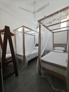 Ένα ή περισσότερα κρεβάτια σε δωμάτιο στο Asoka's Place