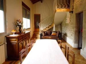 Ένα ή περισσότερα κρεβάτια σε δωμάτιο στο Gîte de Laurens