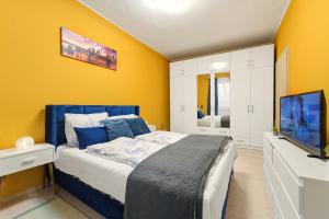 Postel nebo postele na pokoji v ubytování Apartament Luna