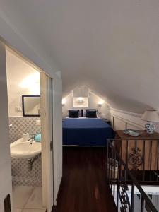 Ένα ή περισσότερα κρεβάτια σε δωμάτιο στο Appartamento centrale Capri