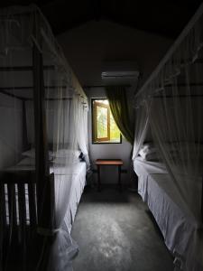 Ένα ή περισσότερα κρεβάτια σε δωμάτιο στο Asoka's Place