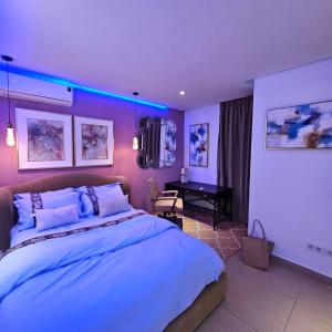 En eller flere senge i et værelse på Appartement de Luxe avec vue mer