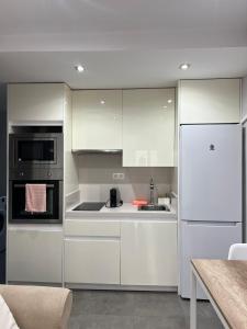 Η κουζίνα ή μικρή κουζίνα στο Modern apartment in Part Alta