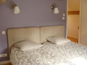 Ένα ή περισσότερα κρεβάτια σε δωμάτιο στο Gîte "Le Ramounel" +7 φωτογραφίες