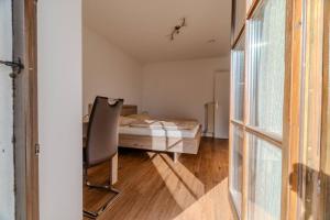 Ένα ή περισσότερα κρεβάτια σε δωμάτιο στο Chrysantihof - Apartment 369 mit POOL & SAUNA