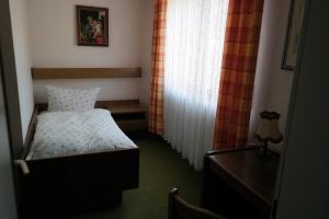 Postel nebo postele na pokoji v ubytování Herzog's Ulsterbrücke