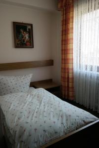 Postel nebo postele na pokoji v ubytování Herzog's Ulsterbrücke