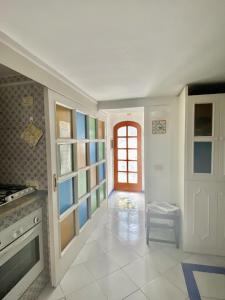 Η κουζίνα ή μικρή κουζίνα στο Appartamento centrale Capri