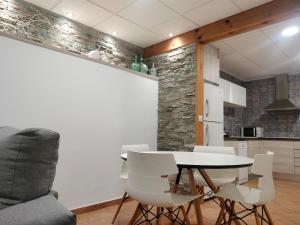 Η κουζίνα ή μικρή κουζίνα στο Apartamentos Montgò