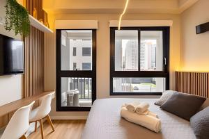 Televiisor ja/või meelelahutuskeskus majutusasutuses Studio próximo ao Hospital São Paulo