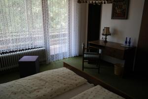 Postel nebo postele na pokoji v ubytování Herzog's Ulsterbrücke