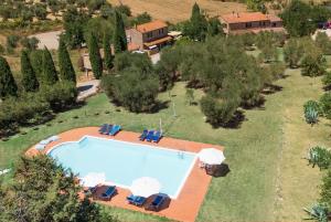 an aerial view of a villa with a swimming pool at La Fontaccia 10 by VacaVilla in Montiano