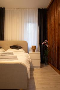 Ένα ή περισσότερα κρεβάτια σε δωμάτιο στο Magnolia Loft