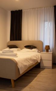 Ένα ή περισσότερα κρεβάτια σε δωμάτιο στο Magnolia Loft