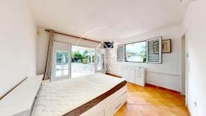 Ένα ή περισσότερα κρεβάτια σε δωμάτιο στο Villa spacieuse à Le Vauclin avec piscine