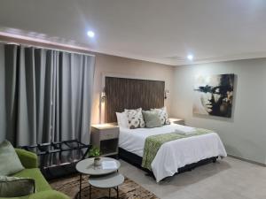 Postel nebo postele na pokoji v ubytování Silvakruin Guest House