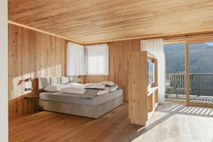 Ένα ή περισσότερα κρεβάτια σε δωμάτιο στο Dickerhof - Urlaub auf dem Bauernhof