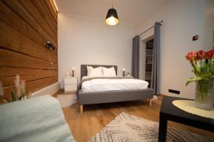 Ένα ή περισσότερα κρεβάτια σε δωμάτιο στο Sweet Escape in Rakvere Center, Perfect for Two