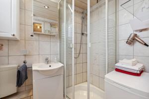 Koupelna v ubytování Ferienhaus Seyer + 28 fotografií