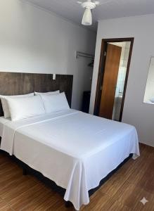 Postel nebo postele na pokoji v ubytování Pousada Canoa Quebrada Ubatuba