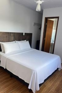 Postel nebo postele na pokoji v ubytování Pousada Canoa Quebrada Ubatuba