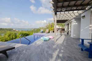 Balkón nebo terasa v ubytování Five Islands Bay Vue Villa