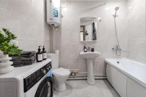 Koupelna v ubytování Круглосуточное самостоятельное заселение рядом с домом Шахмат + 21 fotografií