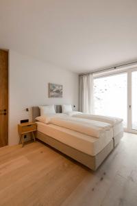 Postel nebo postele na pokoji v ubytování NEW - Design Apartment Carina