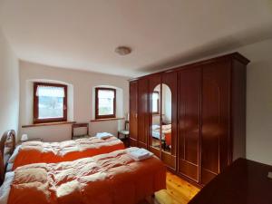 En eller flere senge i et værelse på Casa Carmen a Vinigo