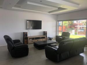 Et tv og/eller underholdning på 416 Beach house