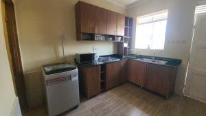 Η κουζίνα ή μικρή κουζίνα στο Jinas Haven