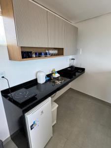 Køkken eller tekøkken på Flat Mirante Alto do Cruzeiro