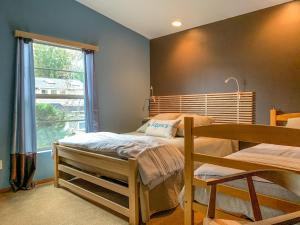 Giường trong phòng chung tại Urban Loft 30 day minimum