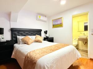 Postel nebo postele na pokoji v ubytování Hotel Veler