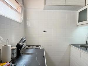 Η κουζίνα ή μικρή κουζίνα στο Sunset Loft