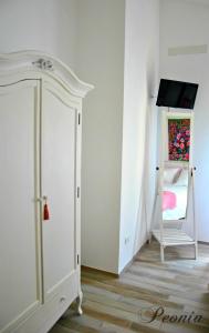 TV a/nebo společenská místnost v ubytování Bed And Breakfast Le Azalee