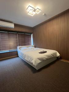 Postel nebo postele na pokoji v ubytování ゲストハウス椙乃家 + 24 fotografií