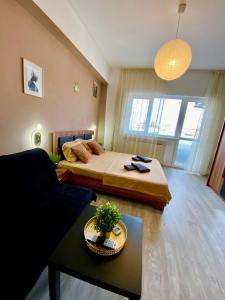 Posezení v ubytování Cozy Caramel Studio Ultracentral Old Town