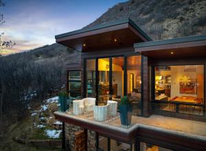 a house with a view of a mountain at Aspen Silverado in Aspen Valley Hospital Heliport