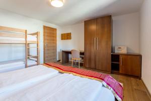 Ένα ή περισσότερα κρεβάτια σε δωμάτιο στο Apartments Garden House