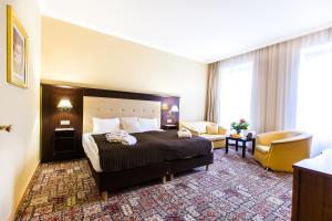 Spa Hotel Panorama tesisinde bir odada yatak veya yataklar