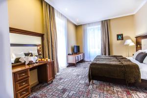 Rúm í herbergi á Spa Hotel Panorama
