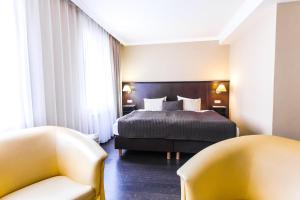 Rúm í herbergi á Spa Hotel Panorama