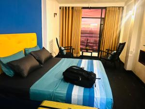 Ένα ή περισσότερα κρεβάτια σε δωμάτιο στο Devil's Beach