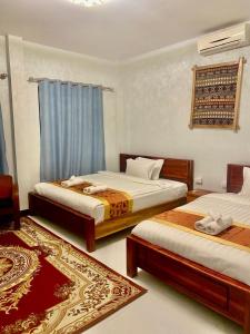 Postel nebo postele na pokoji v ubytování Meet Sunset Villa Luang Prabang